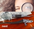 Lupa i nóż  Nest - jaszczurka