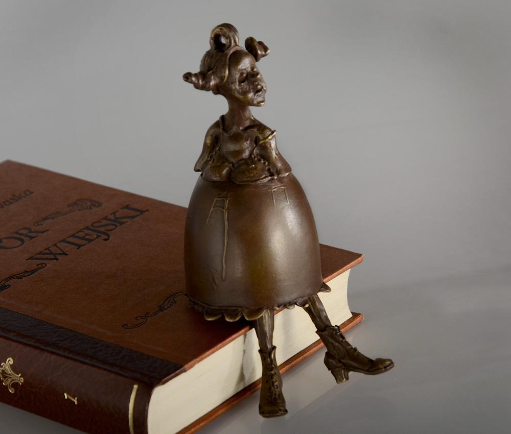 Dzwonek z brązu - kobieta